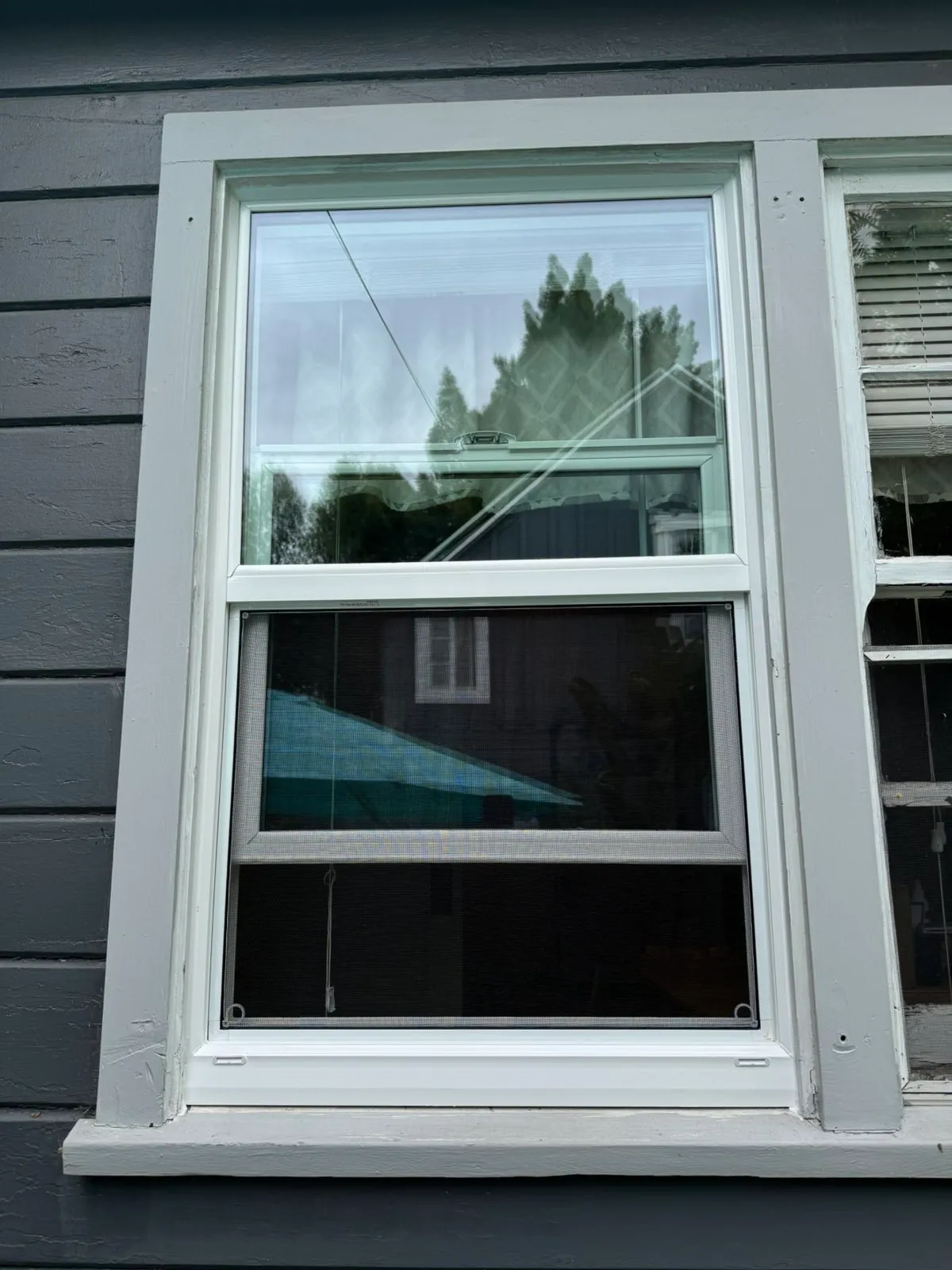 Residential double hung window glass replacement by Glass Smith
